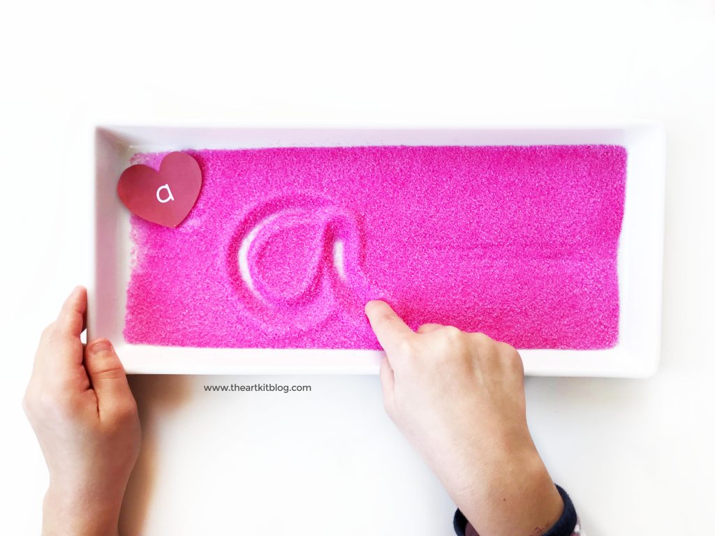 valentines day writing tray free printable hearts letter practice salt tray