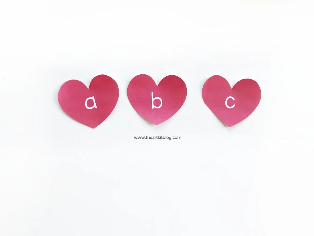 valentine s day writing tray with free printable heart letters the art kit
