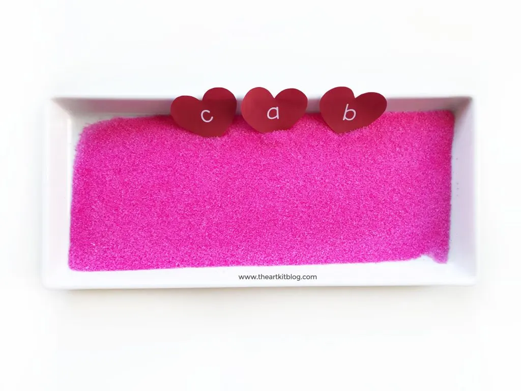 valentines day writing tray free printable hearts letter practice salt tray