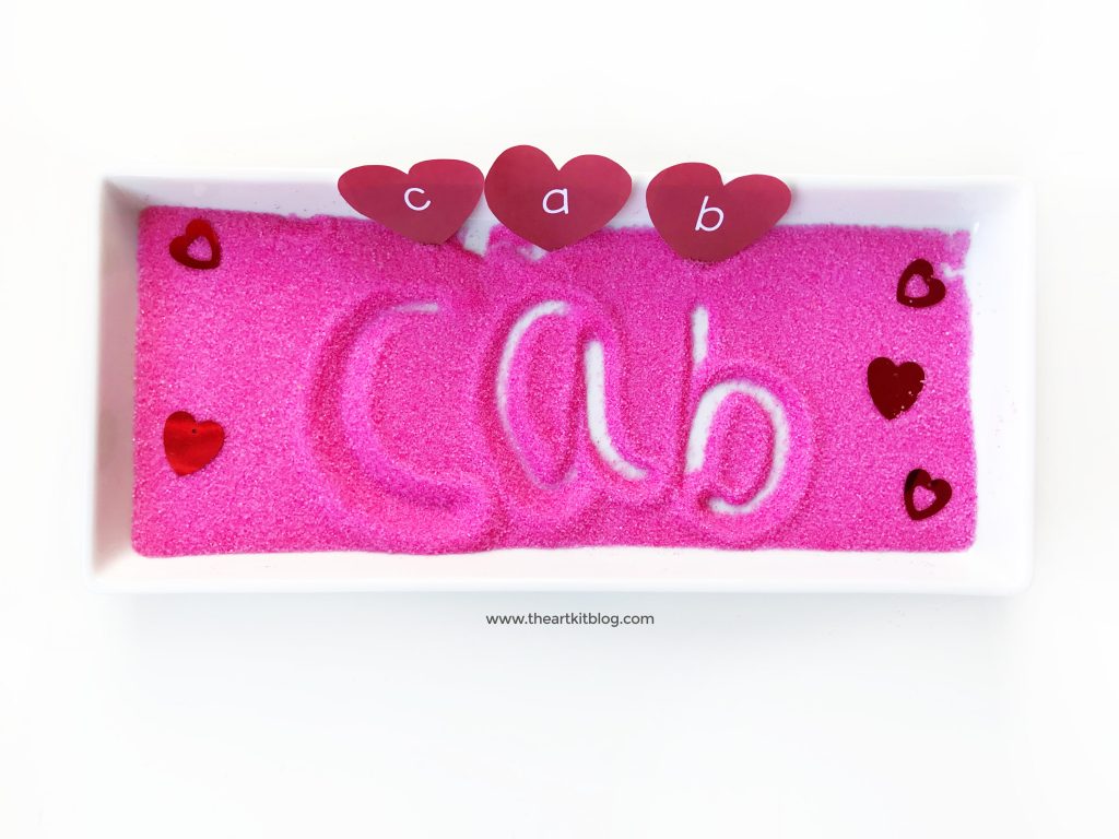 valentines day writing tray free printable hearts letter practice salt tray